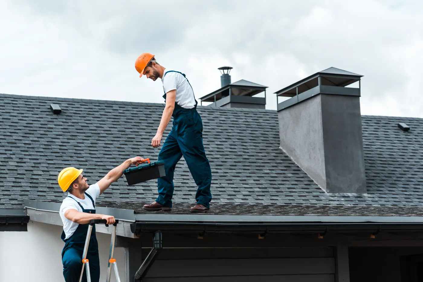 True North Roofing crew members in safety gear on a job site
