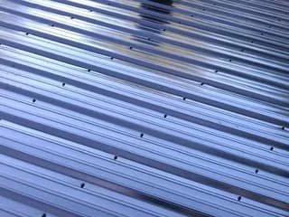 Close-up of a standing seam metal roof panel