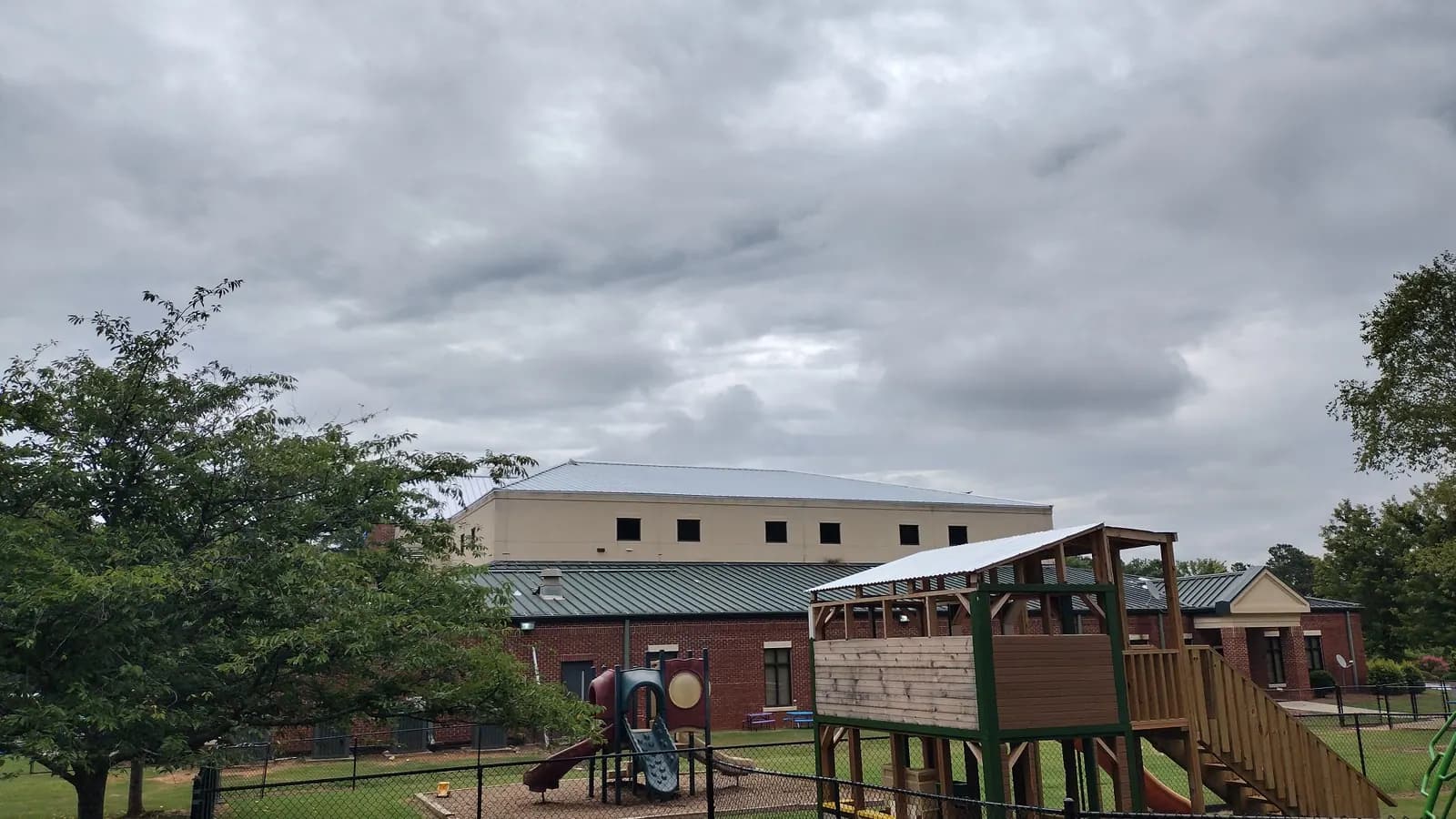 Long metal roof installed across a school building