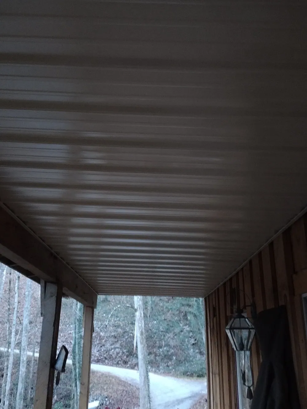 Clean finished soffit and roof underside after repair work